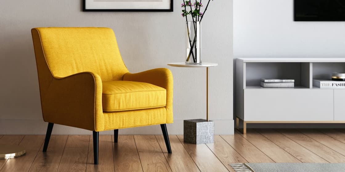 Yellow reading chair in a clean room